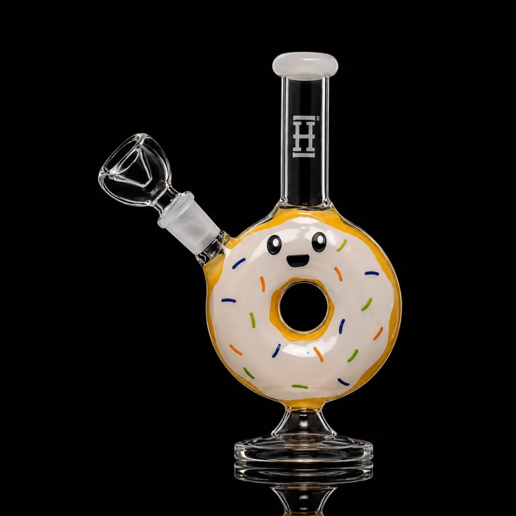 Bong Donut HEMPER en verre borosilicate en forme de donut glacé blanc avec vermicelles multicolores et col noir logoté