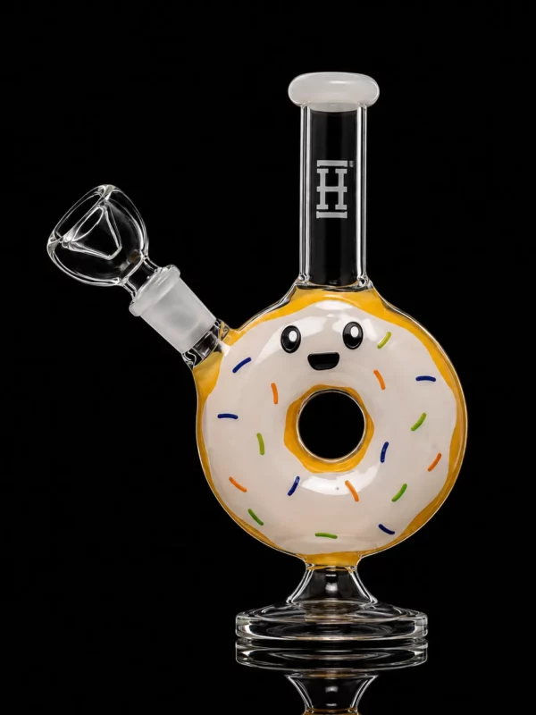 Bong Donut HEMPER en verre borosilicate en forme de donut glacé blanc avec vermicelles multicolores et col noir logoté