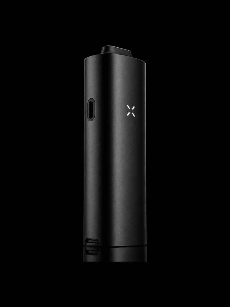 Vaporisateur PAX 4 coloris noir avec LED en pétales - fond noir studio, boutique Nature Lab